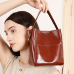 Retro Style Vegetable Tanned Cowhide Small Bucket Bag 2025 New Genuine Leather Niche Pocket Handheld Shoulder Crossbody