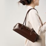 Women's 2025 New Korean Niche Design Shoulder Bag Large Capacity Cowhide Underarm Bag Long Red Baguette Bag